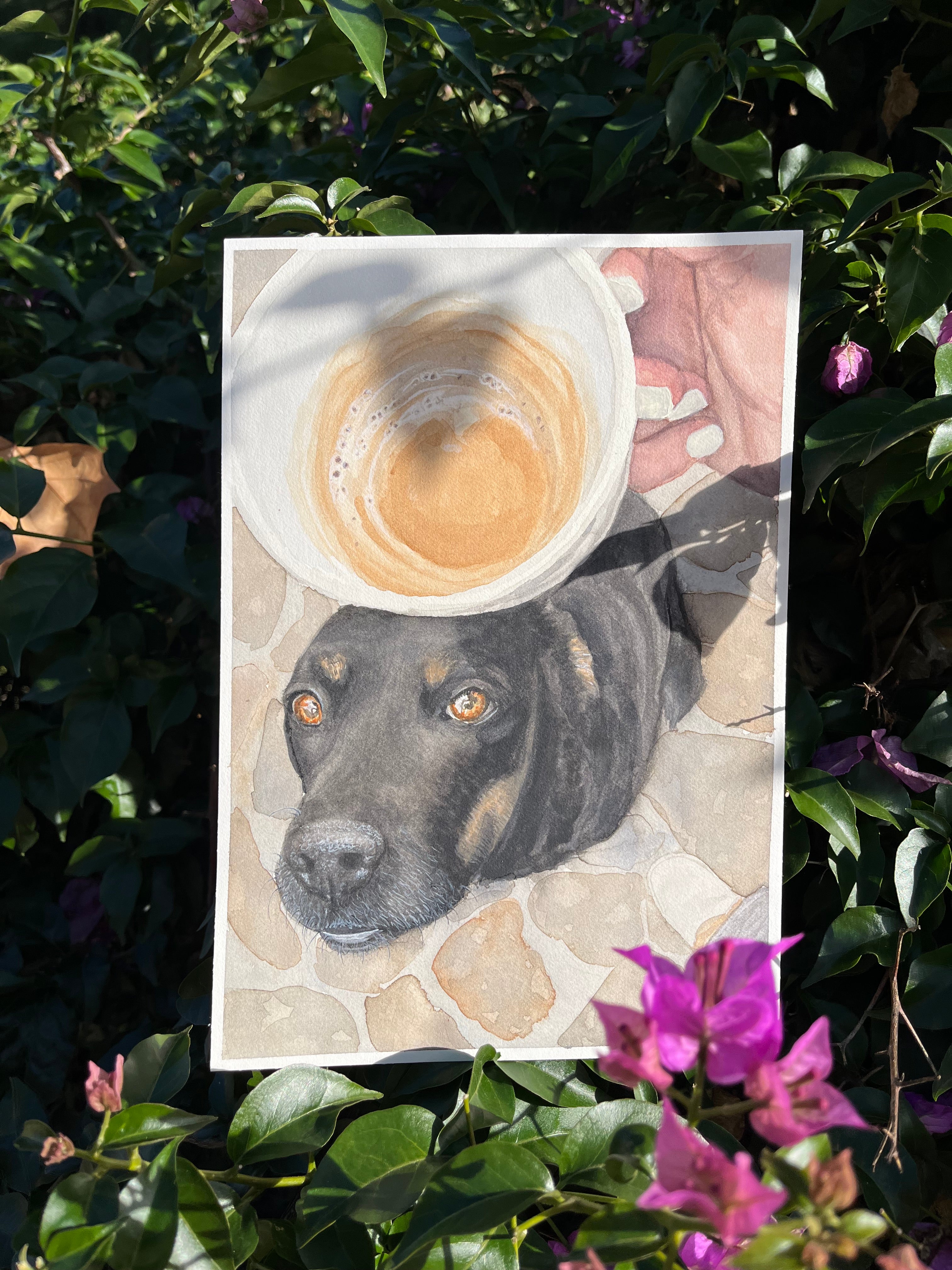 handpainted watercolor llustration of a dog from the point of view of someone looking down at the dog while drinking their coffee . The dog is sitting on a stone surface, and you can see the person's hand holding their cup of coffee.